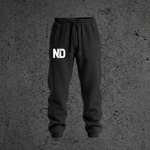 The Kairo Heavyweight Sweatpant in Void Black, front view with the ND monogram on the right leg